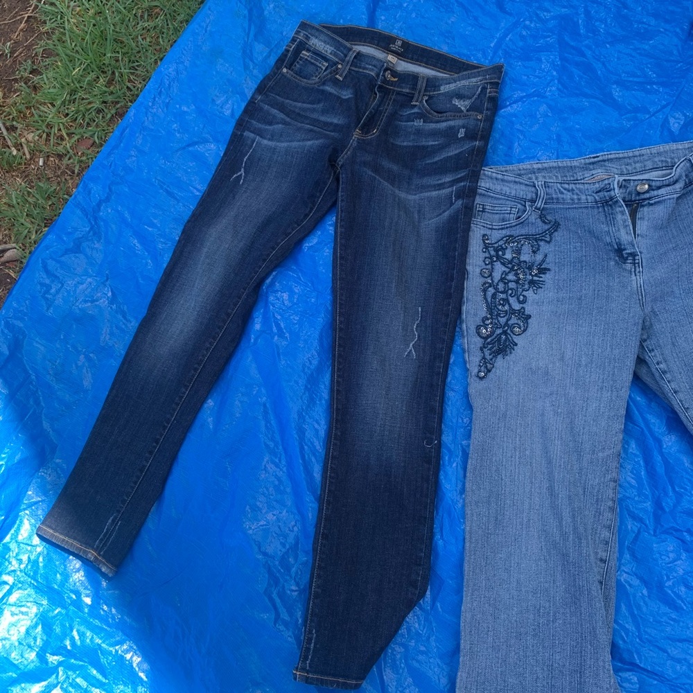 two pairs of woman’s jeans